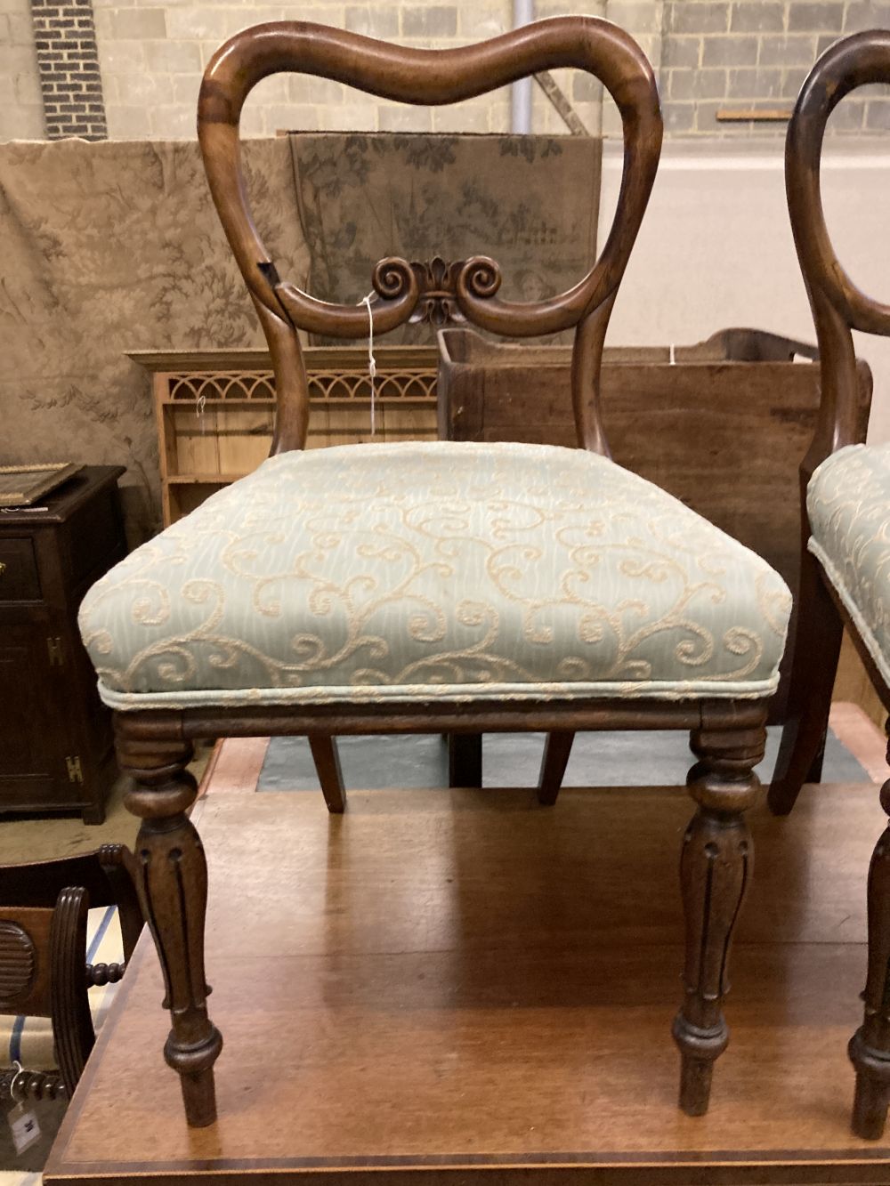 A pair of early Victorian rosewood dining chairs (a.f.)